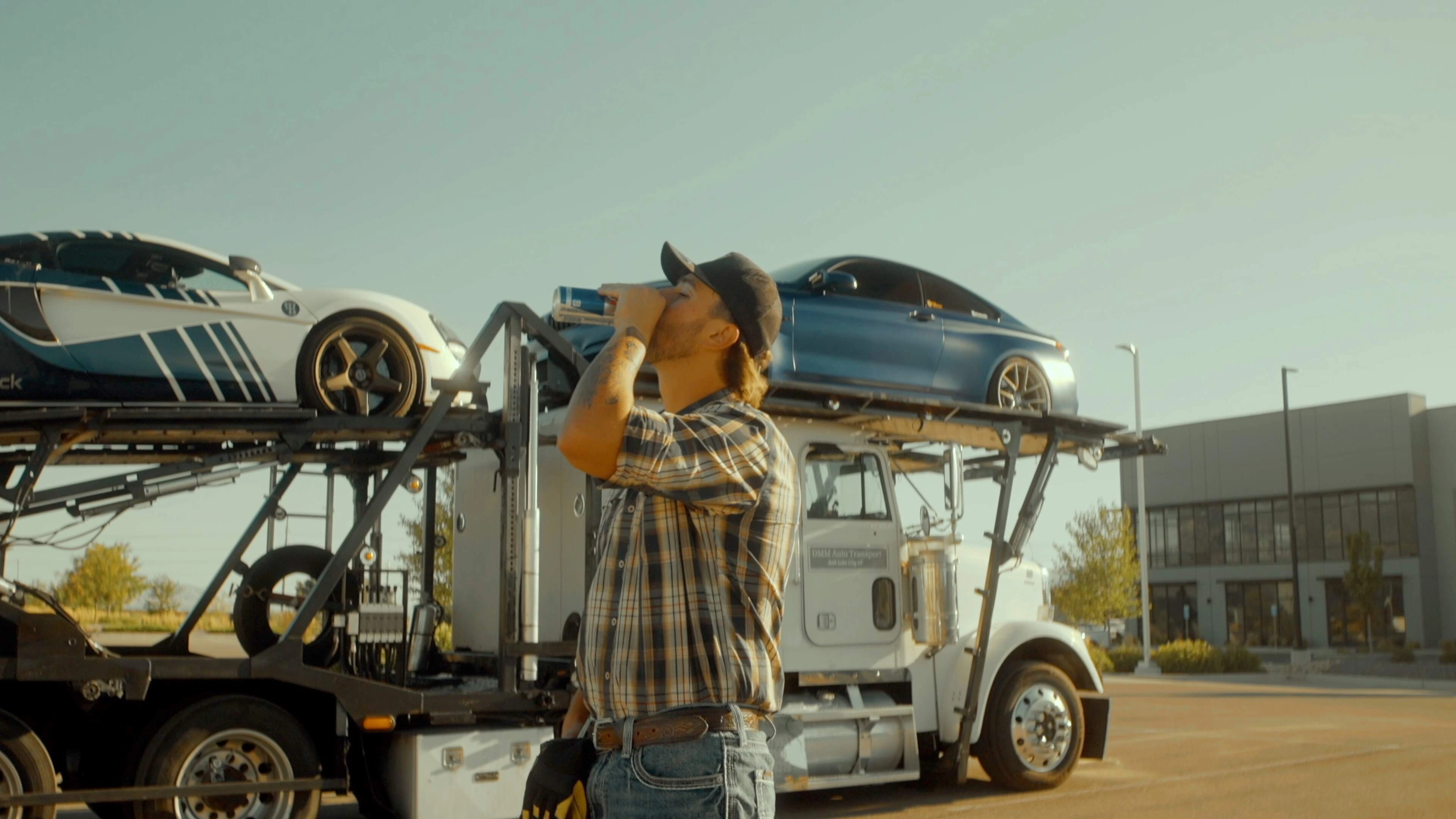Driver next to a loaded hauler
