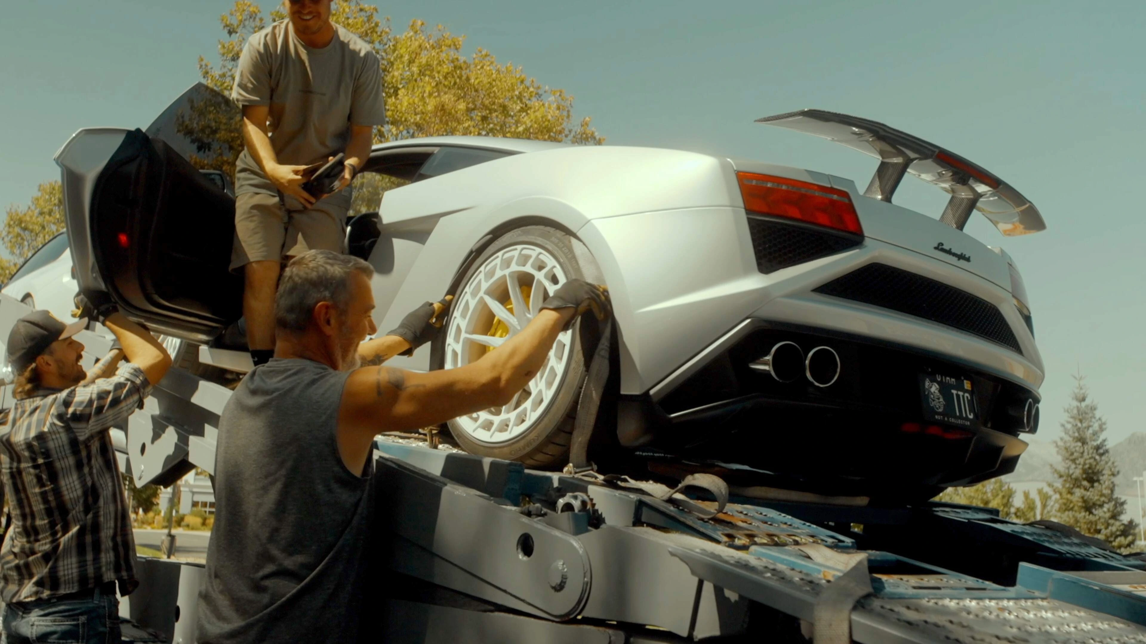 Loading a white Lamborghini